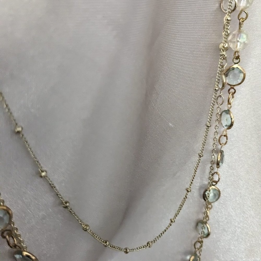 Gold tone glass bezel set crystal triple strand